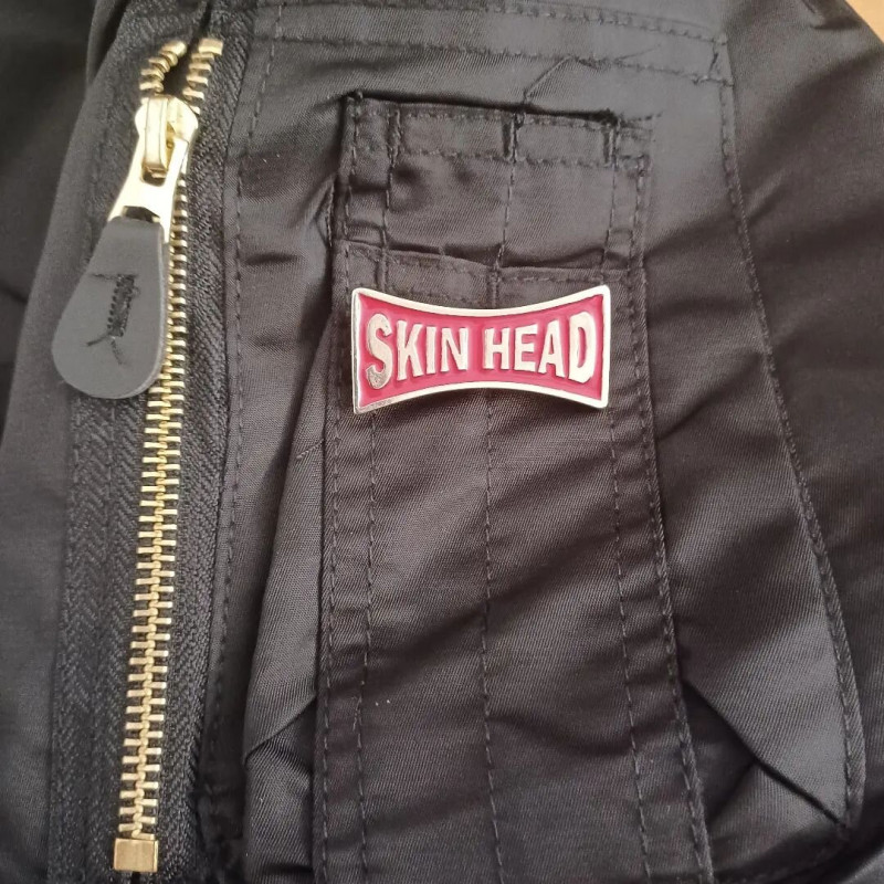 Big red skinhead pin